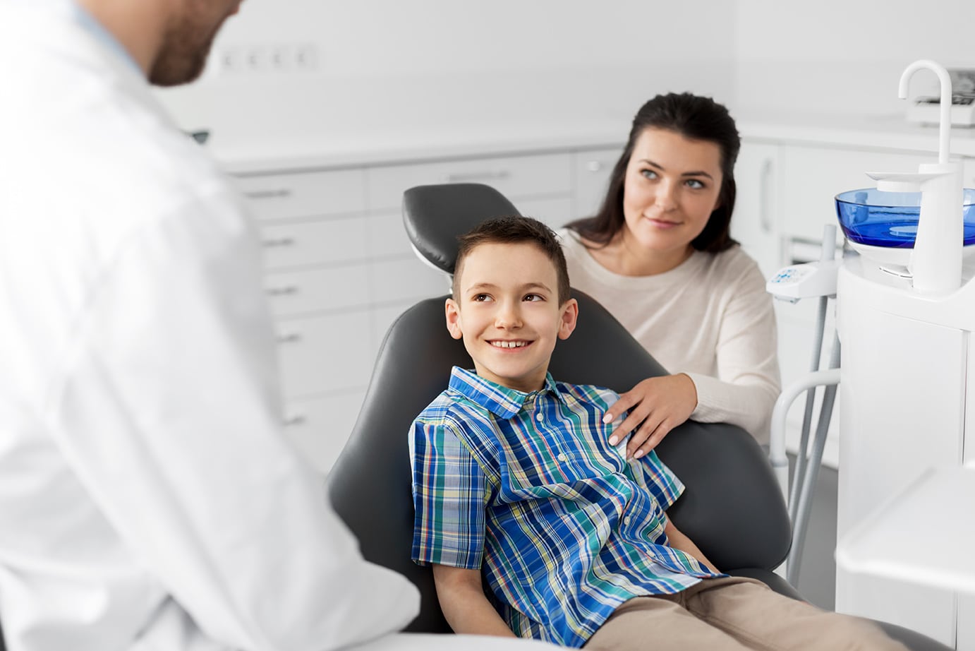 mother and son during orthodontic consultation for Early Orthodontic Treatment at Martin Family Orthodontics<br />
